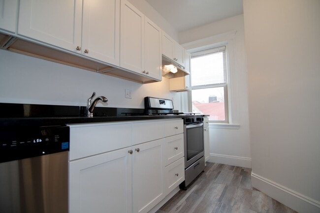 Photo - Renovated 2BR apartment with balcony, heat inc. on Brookilne/Allston line!
