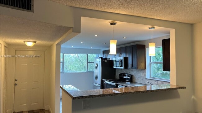 Building Photo - 8300 Sands Point Blvd Unit K301 Rental