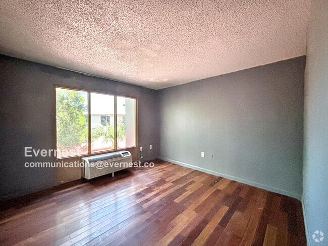 Building Photo - 8421 S Orange Blossom Trl Unit Ste 405 Rental