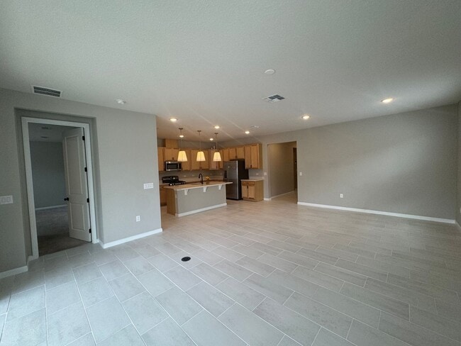 Photo - Where Modern Comfort Meets 4BD/3BA Hometown Charm — Your Story Begins in Okahumpka! FULLY-FENCED!...