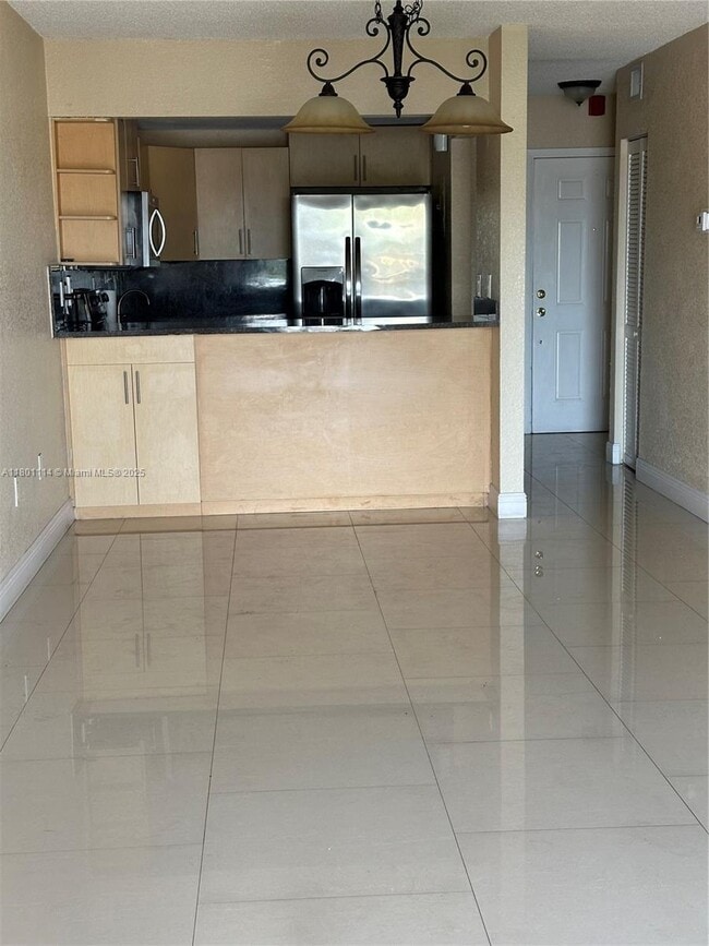 Building Photo - 6095 W 19th Ave Unit 407 Rental