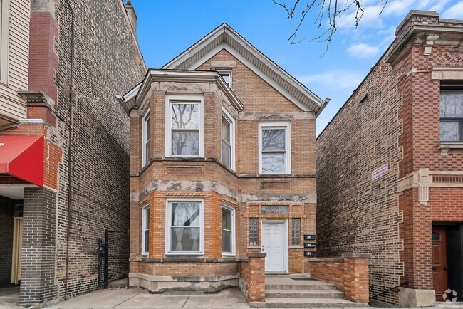 Building Photo - 2420 S Oakley Ave Rental