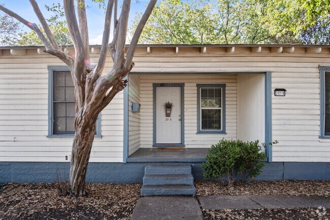 Building Photo - "Charming 2-Bedroom Duplex Retreat on Clou... Rental