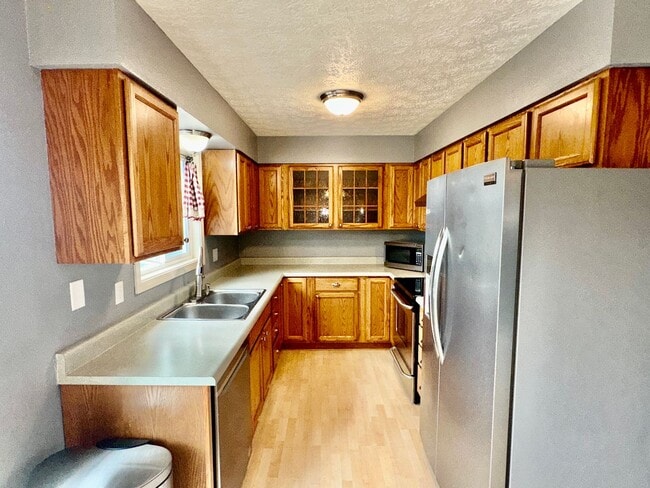 Photo - HUGE BACKYARD, 4 BED 2 BATH, HEATED GARAGE HOME!