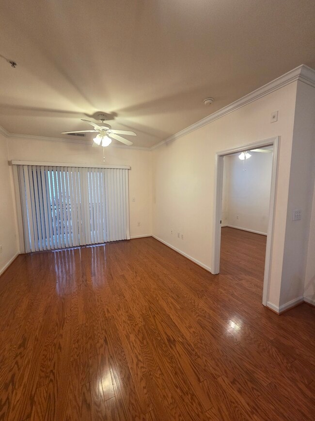 Hard wood flooring in the living room and bedroom - 12945 Centre Park Cir Unit 105