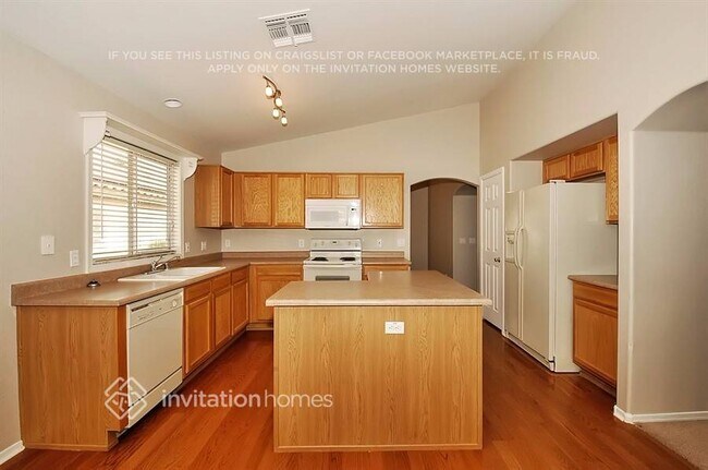 12230 W Aster Dr