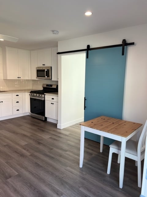 Sliding door closes off the bedroom - 3213 Maine Ave Unidad A