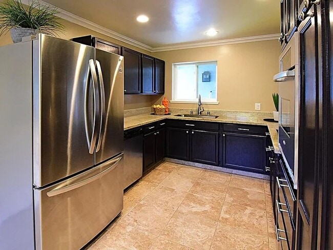 Photo - 3 Bedrooms | 2 Bathrooms | Approx. 1,040 sq. ft.