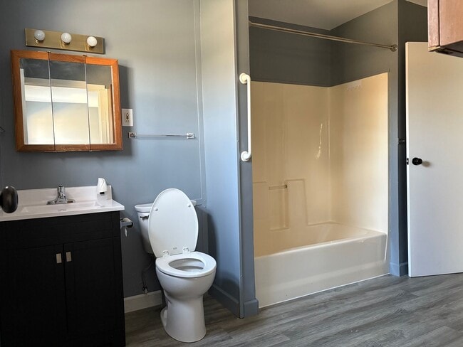 Photo - three bedroom one bath home with attached garage for rent