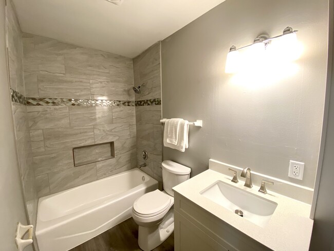 New Ceramic Tiled Main Bath, New Vanity and Luxury Vinyl Plank Flooring! - N89W15976 Main St Townhome