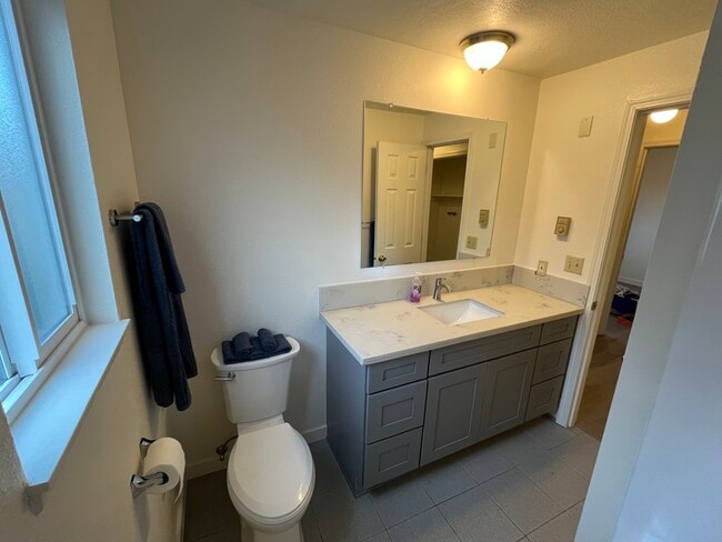 Newly remodeled bathroom with new vanity. - 3333 Willow Ct SE Unit Fourplex - 3333