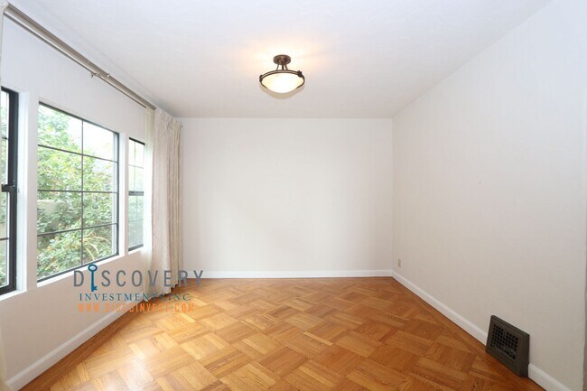 Photo - Oakmore Tudor with Large Backyard and Deck