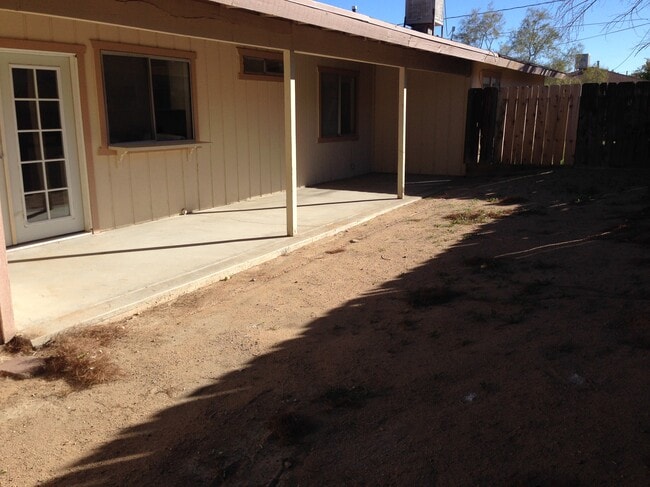 Private covered patio/yard - 709 W Atkins Ave Unit A