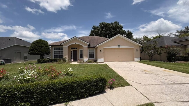 Building Photo - "Stunning 4-Bedroom Lake View Home in Oviedo – Spacious 2,132 Sq Ft Retreat!"