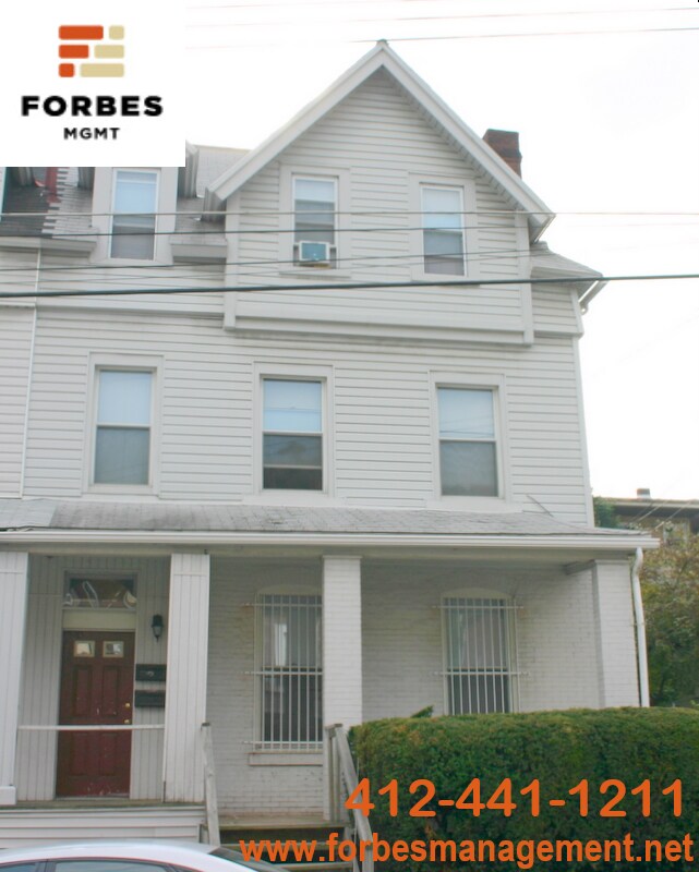 Building Photo - 212 Coltart Ave Unit 1