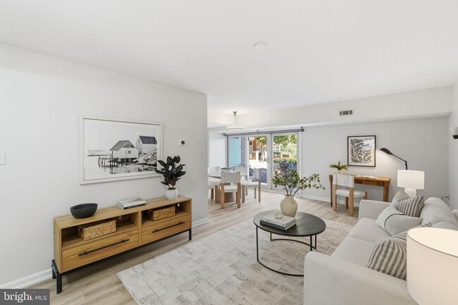 Photo - Welcome to this rarely available and beautifully updated ground-level condo offering the perfect ...