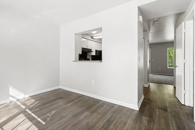 Living room with hardwood floors - Mason Street Townhomes