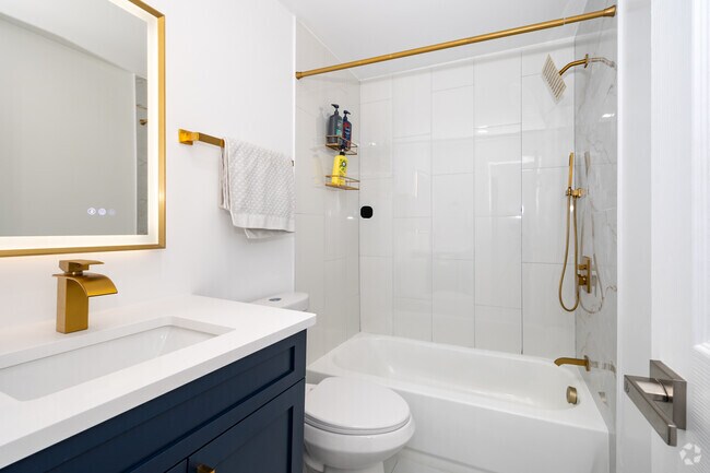 2BR, 2BA - 975SF - East Blue/Gold - Bathroom - Arvada Court Apartments