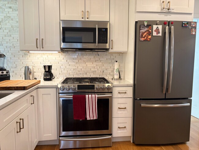 Photo - 4 Stickney Ave Unit Modern 2BR, AC, 3mins to Green Line