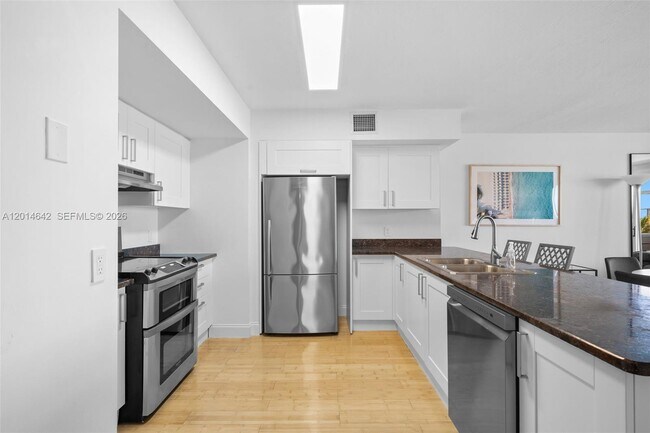 9499 Collins Ave Unit 403