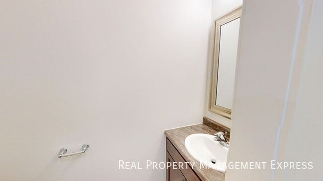 Photo - Charming 2-bedroom, 1.5-bathroom townhome