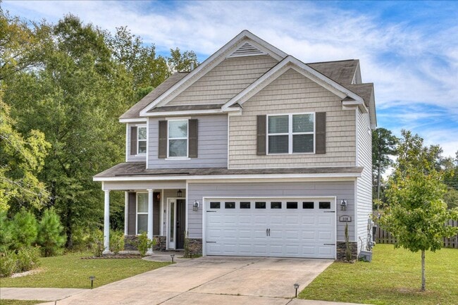 Photo - 4 bed, 2.5 bath home on corner lot with 2 car garage and fenced in back yard