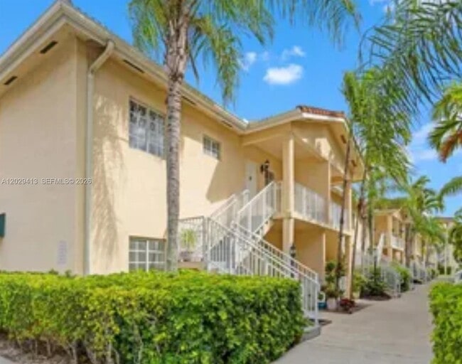 Building Photo - 6972 NW 179th St Unit 108-4