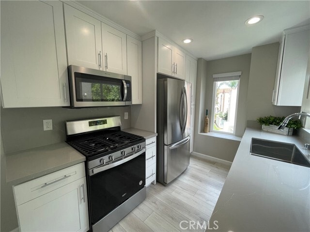 Building Photo - 10855 Camino Ruiz Unit 34