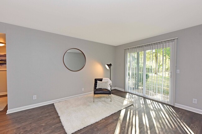 Living Room with Hardwood-Style Flooring - Greenbriar