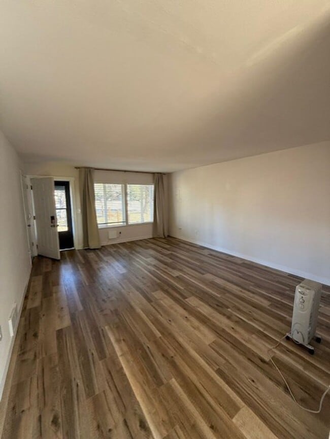 Photo - Updated duplex on quiet street. Large yard, all appliances.