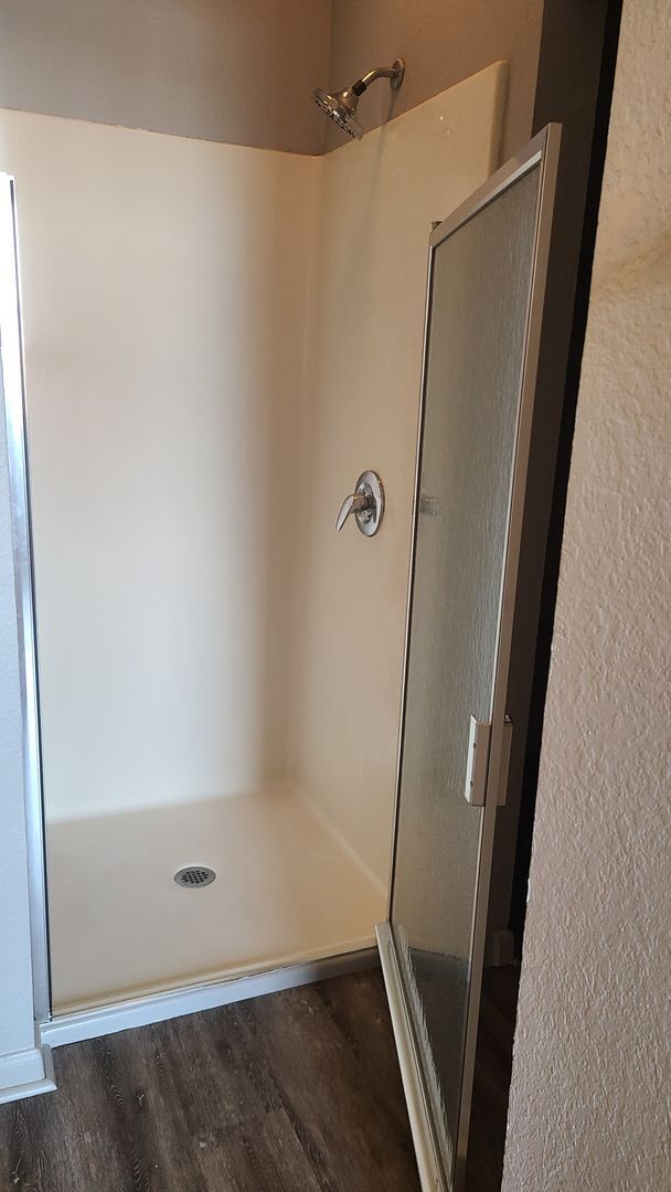 Photo - Upgraded 1brm condo with luxury vinyl flooring and modern lighting.