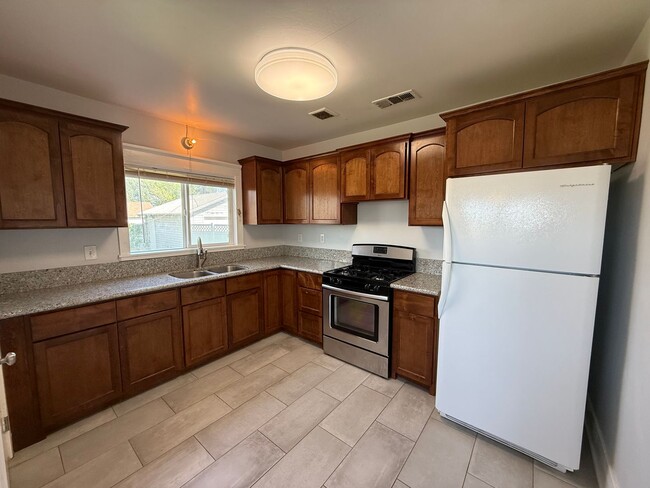 Photo - Charming 2 Bed / 1 Bath Corner Lot Home with Wraparound Porch