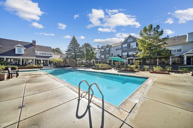 Unwind by the pool or soak up the sunshine on the spacious sundeck. - Villages At Canterfield