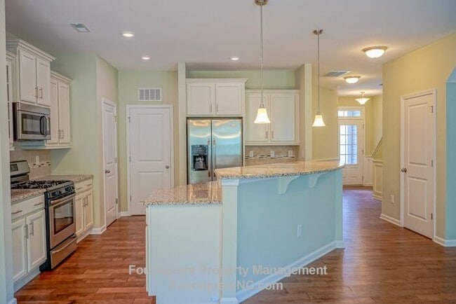 Photo - Charming End-Unit Townhome with Bonus Room, Screened Porch & 2-Car Garage – Convenient to RTP, RD...