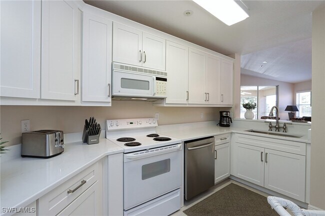 Building Photo - 6544 Huntington Lakes Cir Unit 9-204