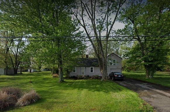 Spacious yard totaling .78 acres with mature trees.