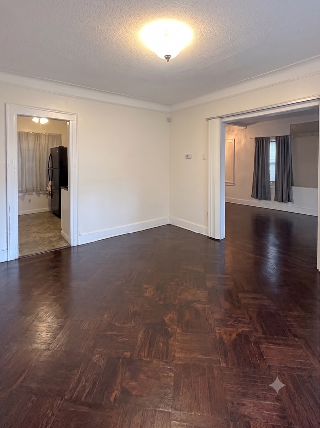Photo - 4-Bedroom, 1-Bathroom Residence w/ Washer and Dryer