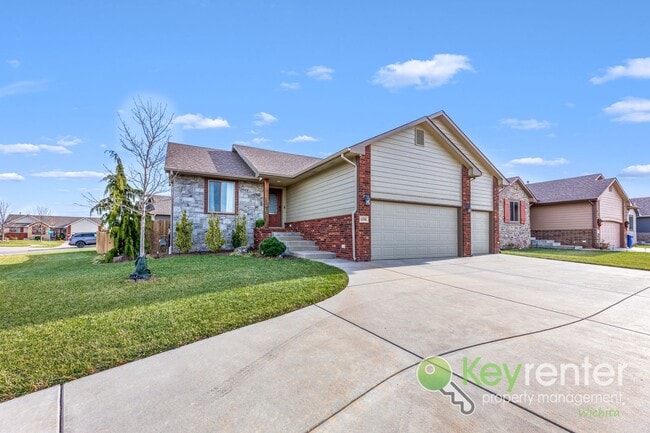 Photo - Spacious 4-Bedroom Home with Finished Basement & 3-Car Garage – Derby, KS