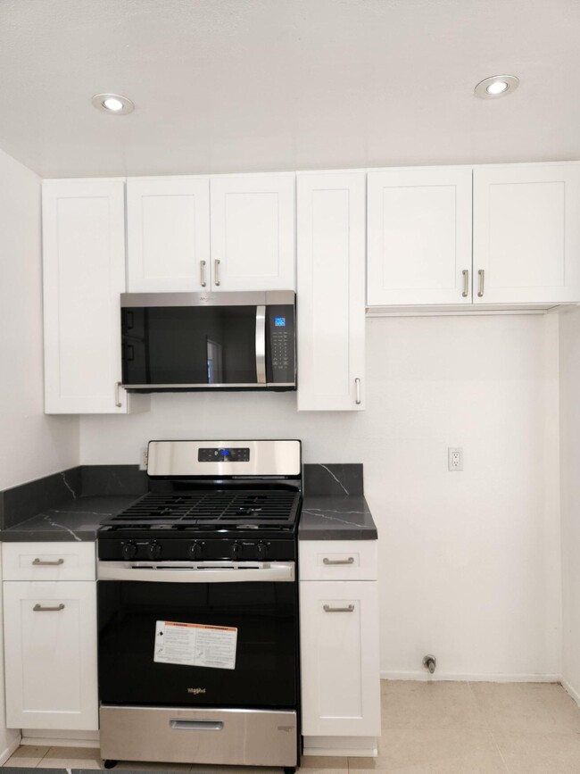 Brand-new appliances and fully remodeled kitchen - 7640 Oso Ave Apartments Unit 220