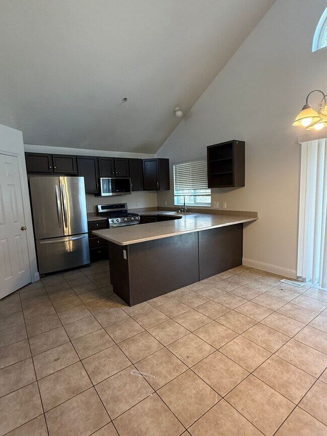 Photo - Beautiful home with 2 car garage, large back deck and central air