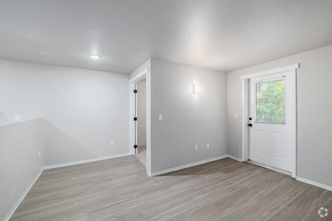 2BR, 1BA - 542SF - Living Room - Cedar Apartments