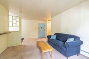 1BR, 1BA - 700SF - Balcony - Living/Dining Room