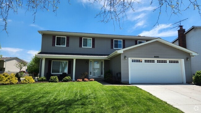 Building Photo - Charming 4BR House in Woodridge