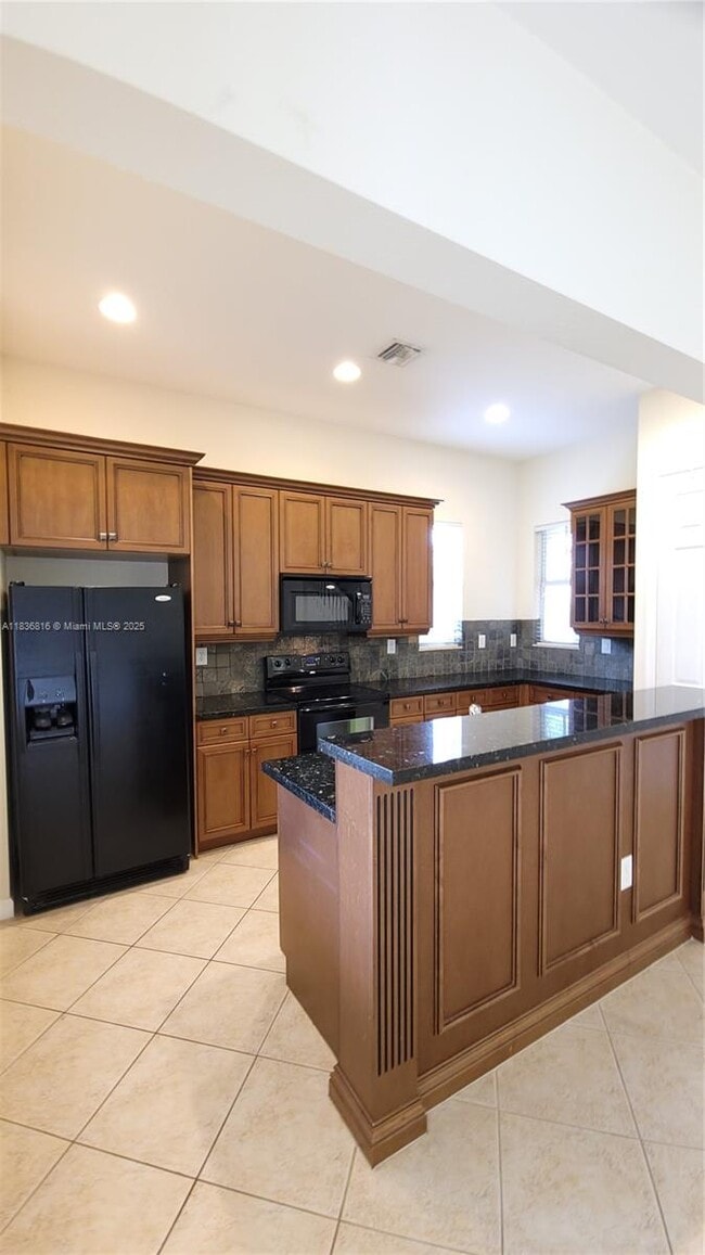 Photo - 6033 NW 118th Dr Townhome