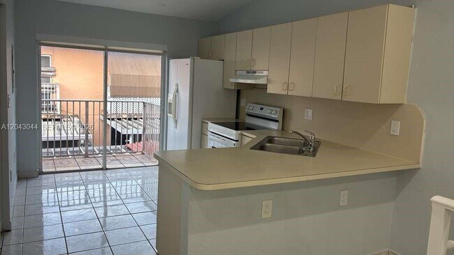 6891 W 36th Ave Unit 202