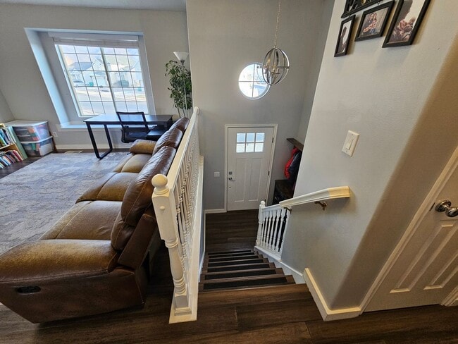 Photo - Spacious 4-Bed, 2-Bath Pet-Friendly Home with Central Air & 2-Car Garage! - Available NOW!