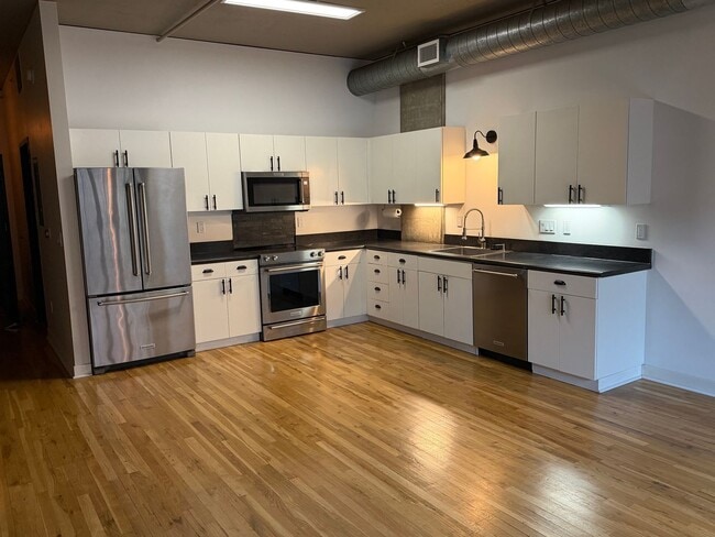 Photo - McKenzie Lofts - 2nd floor west facing studio w/parking/storage/covered balcony Unit MCK215