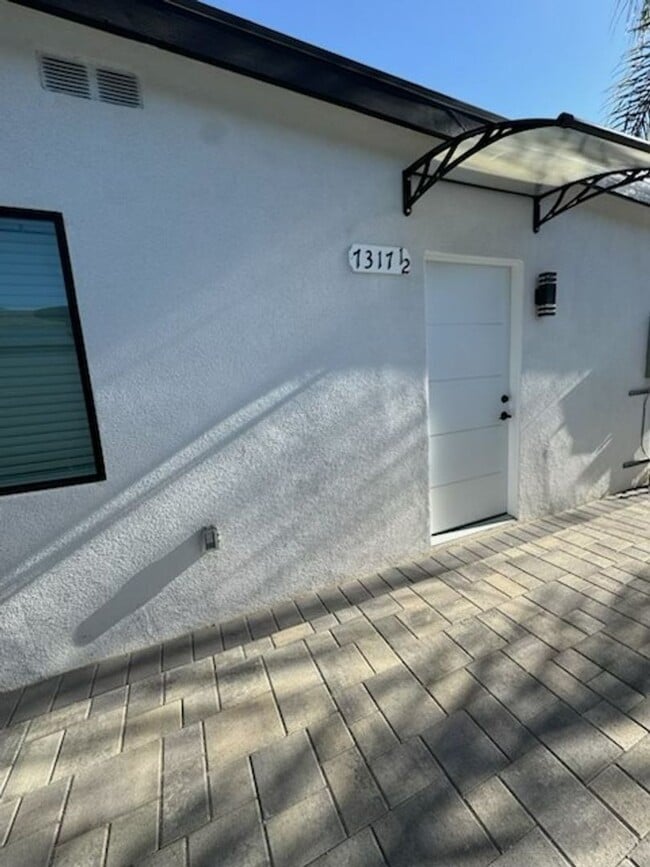Building Photo - 7317-7321 Garden Grove Avenue Unit 7317 1/2 Garden Grove