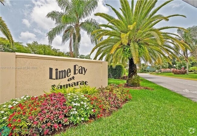 Building Photo - 9301 Lime Bay Blvd Unit 204 Rental