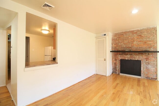 Building Photo - Spacious 2 BR 2 BA w/ Decorative Fireplace... Unit #D Rental